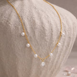 Lustrous Pearl Charm Necklace